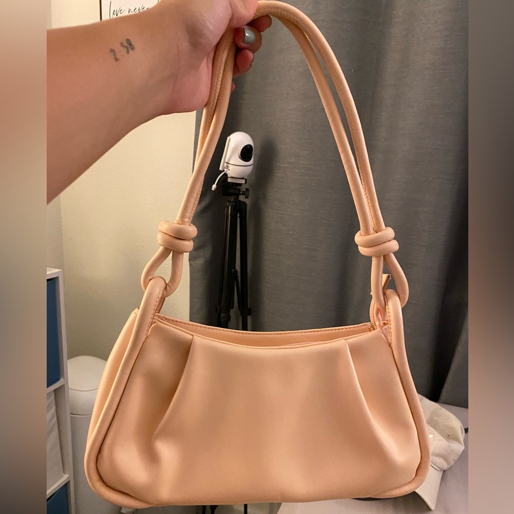 Super cute pale pink/blush colored purse!